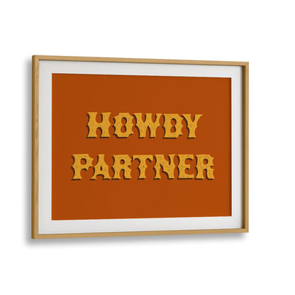 Rustic HOWDY PARTNER, QUOTES & TYPOGRAPHY POSTERS framed in oak, perfect for adding charm to any space.